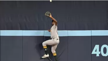 Denzel Clarke's Incredible Home Run Robbery Steals the Show for Athletics
